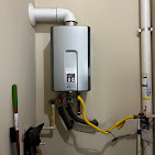Tankless water heater installation in utility closet